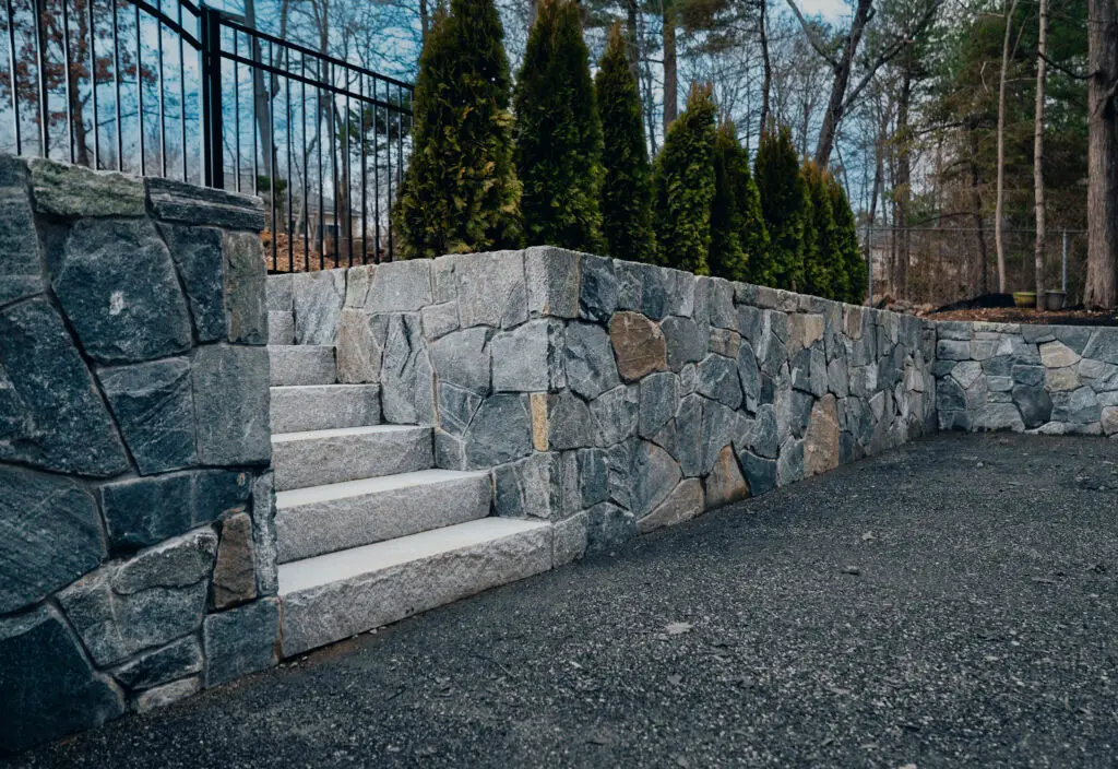 Image of a small retaining wall with natural stones