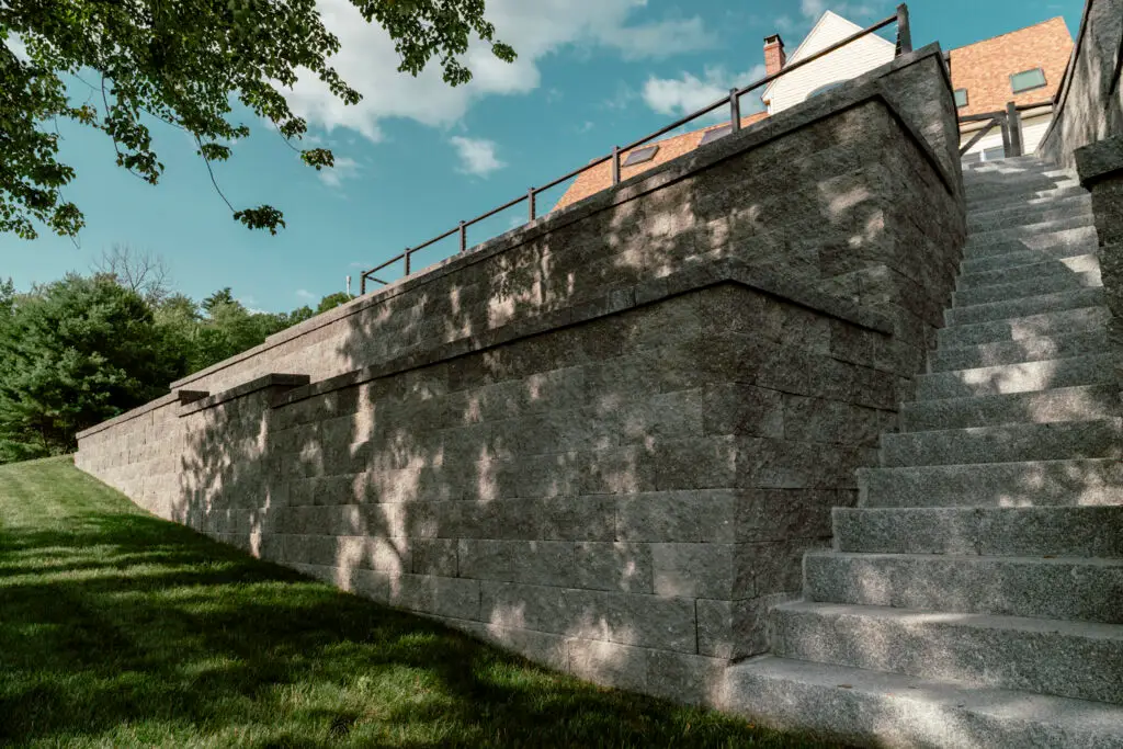 A huge retaining wall on a backyard