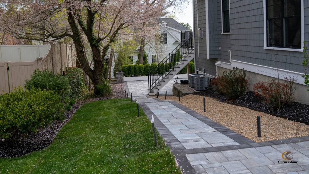 Photo of a side walkway with Cambridge pavers