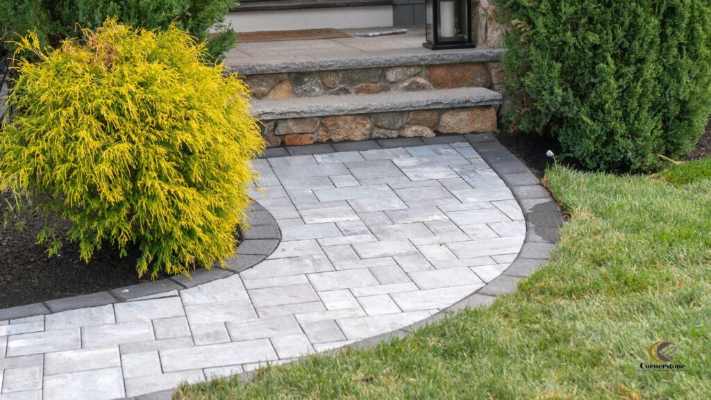 A photo of a concrete pavers front-yard with Cambridge pavers